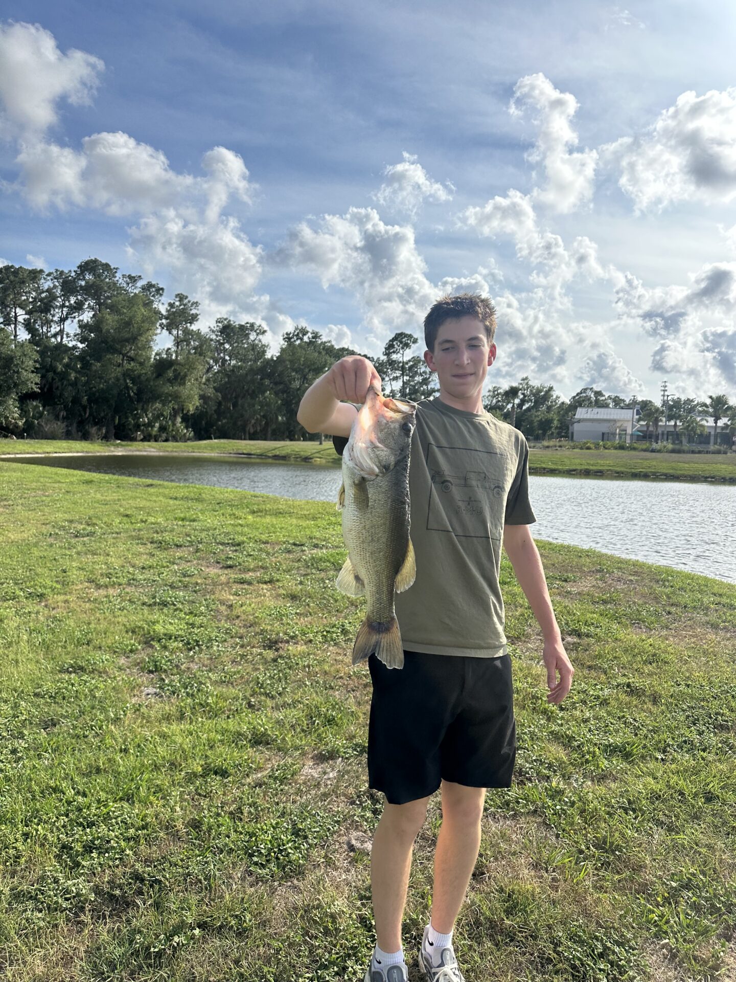 guy showing his big fish catch
